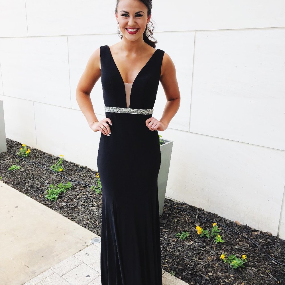 Black Straight gown with beaded belt waistline.